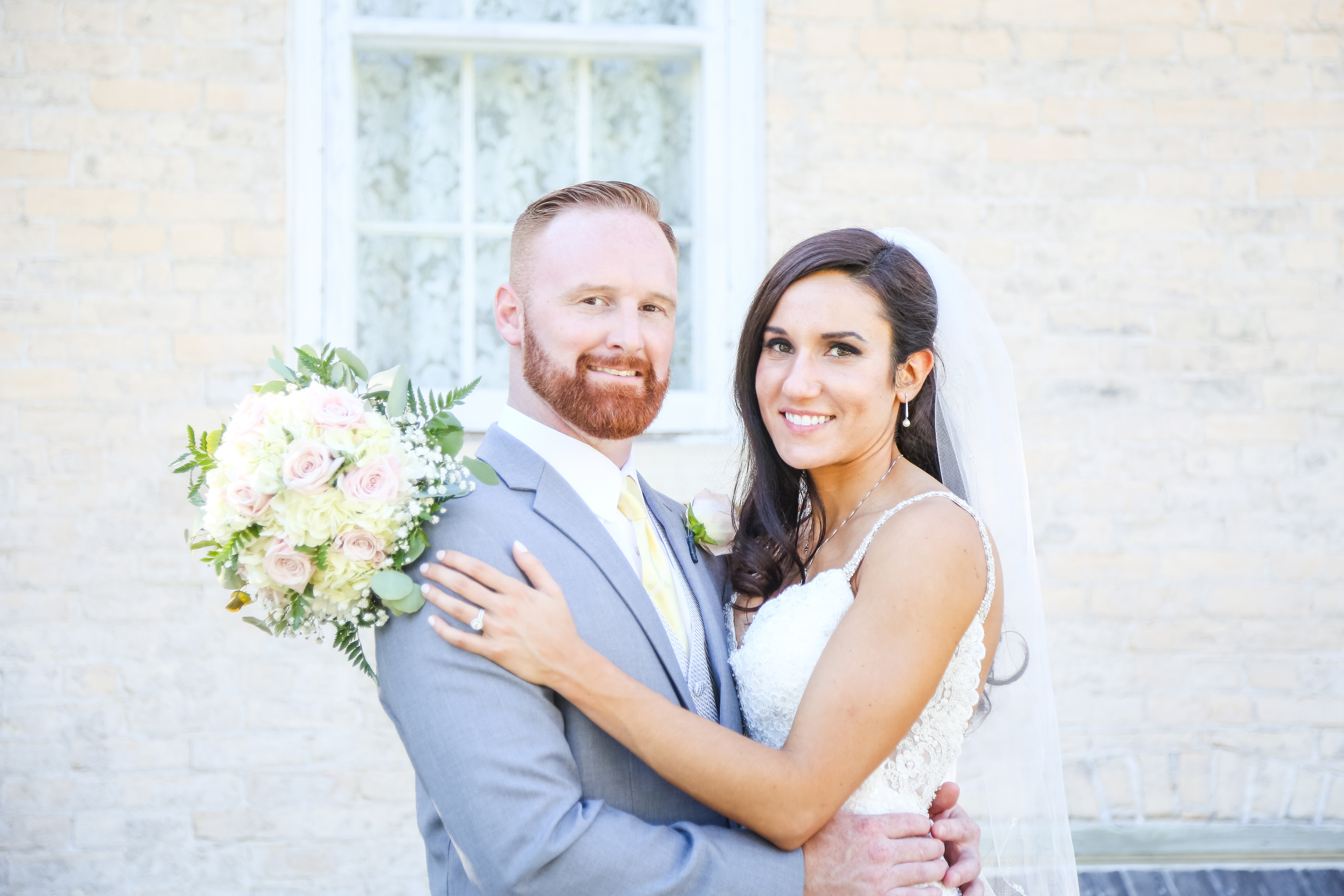 A groom and a bride with stunning makeup